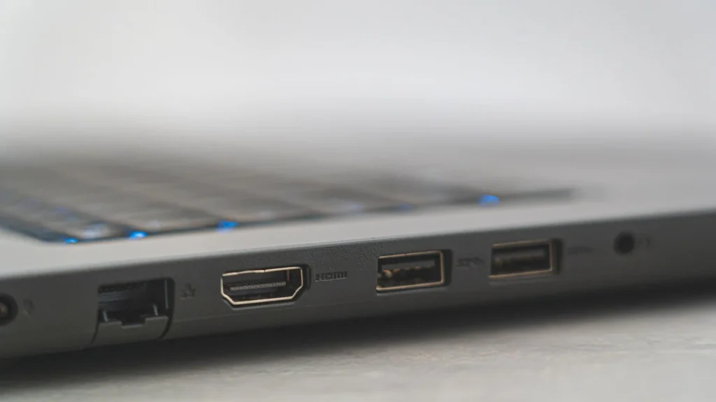 Detailed view of laptop ports including HDMI, USB, and Ethernet, showcasing connectivity options. — selected for United States readers