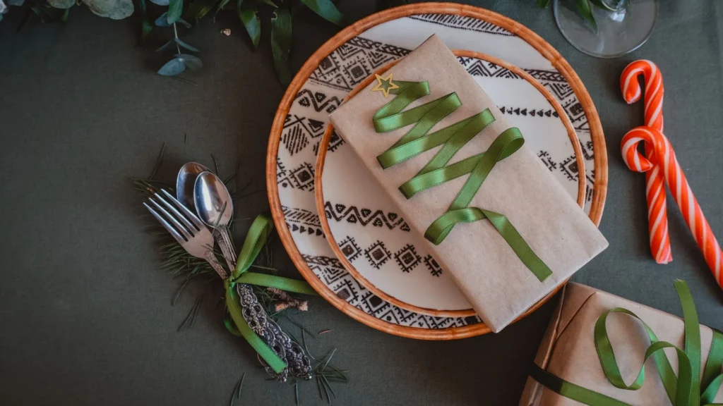 Elegant Christmas table setting with wrapped gifts and candy canes, ideal for holiday inspirations. — selected for United Kingdom readers